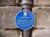 Blue Plaque with brief history of the gatehouse